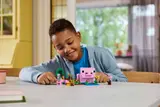 Child playing with Minecraft LEGO.