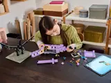 Child building LEGO End Ship.
