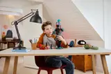 Child playing with Enderman Tower.