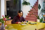 Person building LEGO Art Tiger