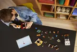 LEGO Minecraft 21273 building process with digital instructions.
