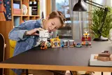 Child playing with LEGO Minecraft Ghast.