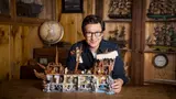 Designer holding the Goonies ship set.