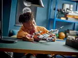 Child playing with N-1 Starfighter.