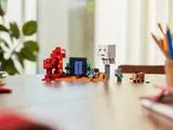 Child with completed LEGO Nether set.