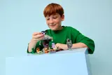 Child examining Pale Figure minifigure.