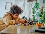 Child playing with the LEGO TIE Bomber set.