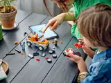 Building LEGO with tablet.