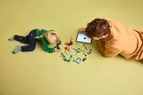 Building Toy Story set with iPad.