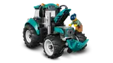Tractor with minifigure inspecting engine.