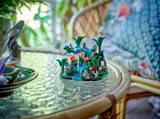 Diorama displayed on a glass table.