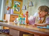Child playing with castle
