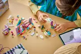 Child building Unicorn Dream Café.