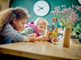 Kids playing with 'Up' House set.