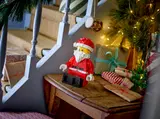 Santa Minifigure in festive home.