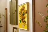 LEGO Van Gogh Sunflowers displayed on a wall.