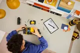 Building with digital instructions.