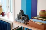 LEGO Wednesday dorm on display shelf.