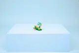 LEGO tropical fish model on a pedestal.