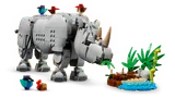 LEGO rhino grazing from a plant and water build.