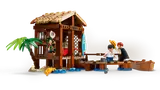 Side view of hut and dock with minifigures.
