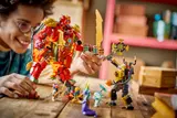 Kid posing Ninjago Mech.