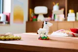 LEGO horse display on a desk.