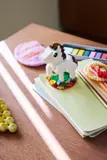 LEGO horse on notebooks.