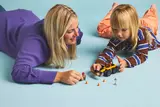 Child interacting with the loader during play.