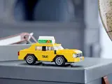 LEGO Yellow Taxi on display.