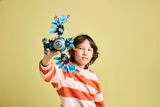 Child holds Time Owl