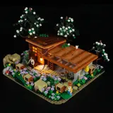 Illuminated Lumibricks Bee Farm at night.