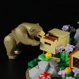 Bear raiding a beehive.