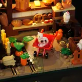 Close-up of bakery with cat.
