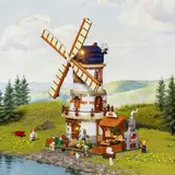 Windmill in a natural landscape diorama.
