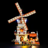 Lit Lumibricks windmill and bakery at night.