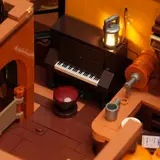 Lit piano and lantern.