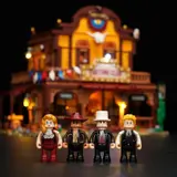 Minifigures with blurred lit building.