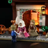 Minifigures at illuminated entrance.