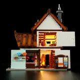 Open shop interior, two illuminated levels.