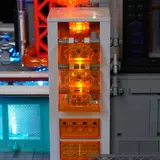 Close-up of lit orange data modules.
