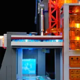 Close-up of blue underlighting at tower base.
