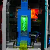 Close-up of glowing green data core.