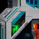 Close-up of angled SNOT wall with teal accents.