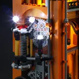 Lit clock tower gears.