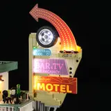 Illuminated vintage motel marquee.