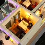 Illuminated motel interior rooms.