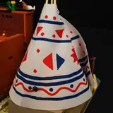 Close-up of illuminated fabric tipi.
