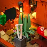Interior close-up, plant and bones.