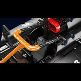 Close-up of the Mould King MCL Racing Car's mid-section, showing engine details and orange tubing.
